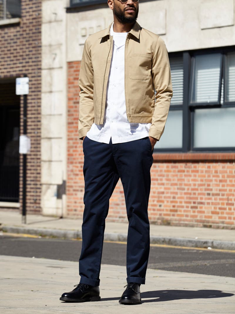Men's outfit idea for 2022 with harrington jacket, short-sleeved plain shirt, navy chinos, oxford / derby shoes. Suitable for spring, summer and fall.