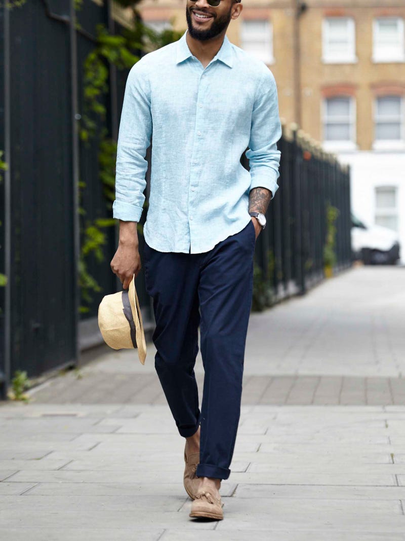 Men's outfit idea for 2022 with linen shirt, navy chinos, leather strap watch, loafers. Suitable for summer.